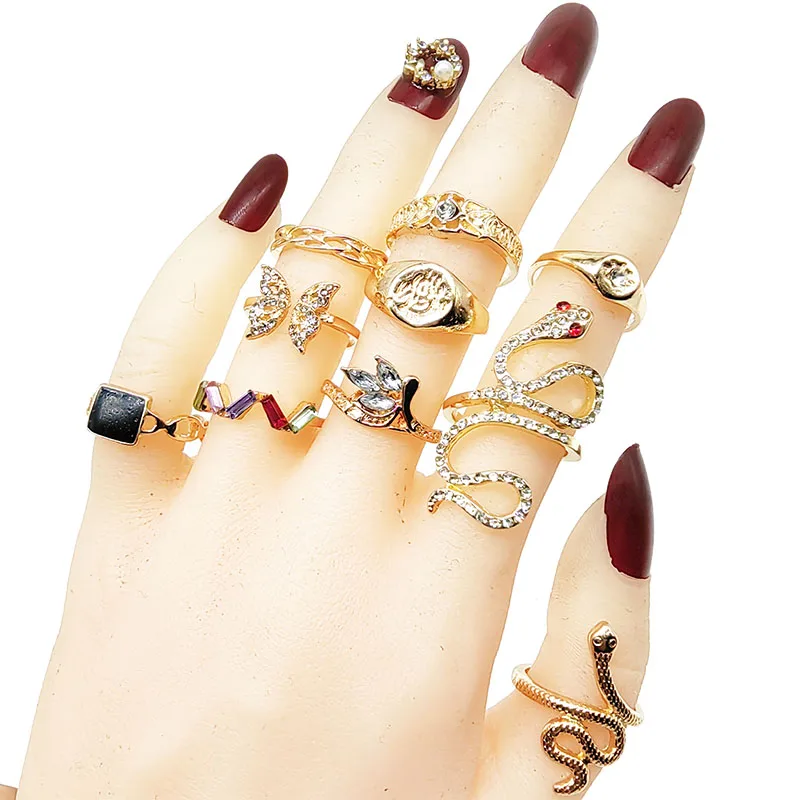 30pcs-Lot-Wholesale-New-Mix-Style-Big-Snake-Finger-Rings-For-Women-Black-Enamel-Cutout-Butterfly-2.webp
